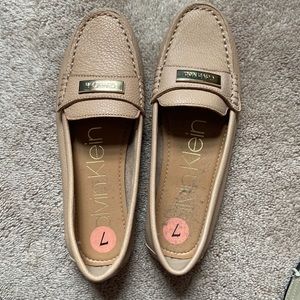 Calvin Klein tan womens loafers size 7. Brand new never worn.